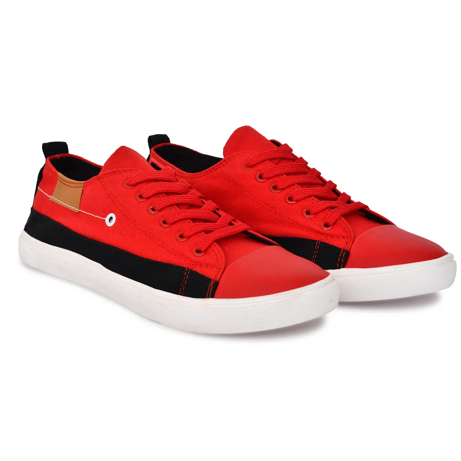 Cheap Canvas Shoes for Men – 4 Stylish Two-Tone Casual Shoes for Comfort and Versatility 4 A pair of vibrant red and black casual sneakers with a low-cut design, red laces, a bold red toe cap, and contrasting black accents. The sneakers have a sleek white sole, perfect for casual wear.
