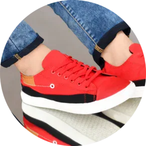 Cheap Canvas shoes for men placed on a rustic wooden surface, captured in a professional photo showcasing the timeless charm of canvas footwear