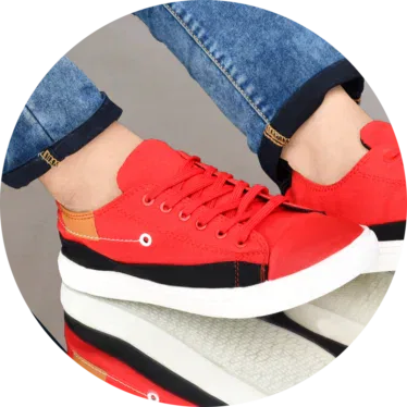 Cheap Canvas shoes for men placed on a rustic wooden surface, captured in a professional photo showcasing the timeless charm of canvas footwear