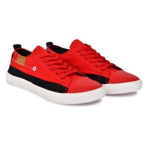 A pair of vibrant red and black casual sneakers with a low-cut design, red laces, a bold red toe cap, and contrasting black accents. The sneakers have a sleek white sole, perfect for casual wear.