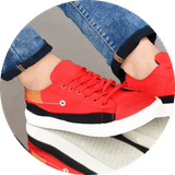 Cheap Canvas shoes for men placed on a rustic wooden surface, captured in a professional photo showcasing the timeless charm of canvas footwear