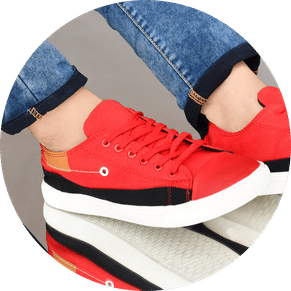 Cheap Canvas shoes for men placed on a rustic wooden surface, captured in a professional photo showcasing the timeless charm of canvas footwear