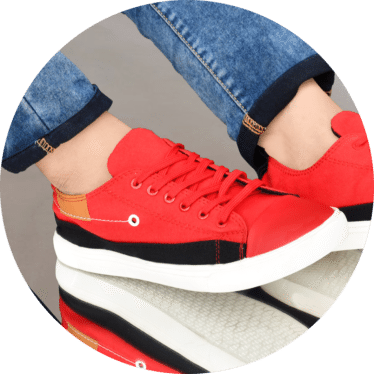 Cheap Canvas shoes for men placed on a rustic wooden surface, captured in a professional photo showcasing the timeless charm of canvas footwear